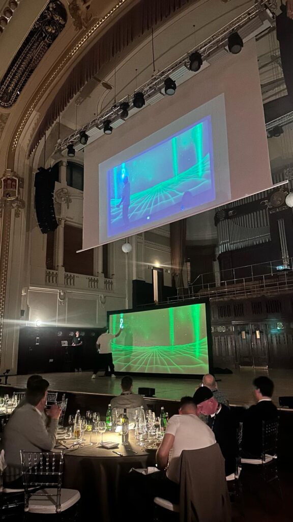Light show painting at a corporate event in Smetana Hall prague