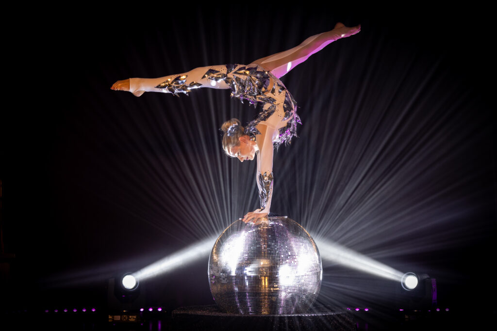 Mirror Ball acrobat performing at a corporate event
