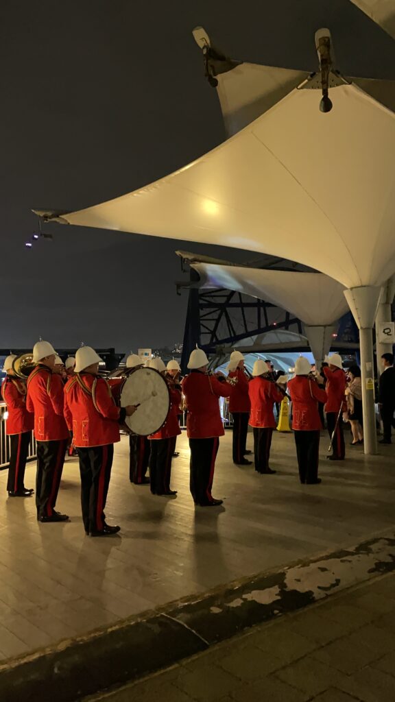 Traditional Military band welcoming guests to the Silver Sturgeo boat on the Thames, London