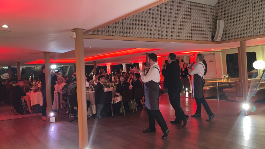Singing Opera Waiters performing on the Silver Sturgeon at a Gala dinner ni London