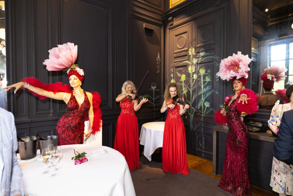 violin duo with themed entertainment dancers 