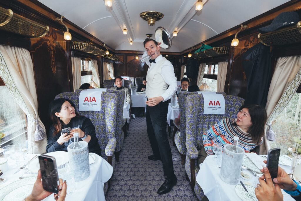 Juggling waiter greeting guests as part of our corporate entertainment in London.